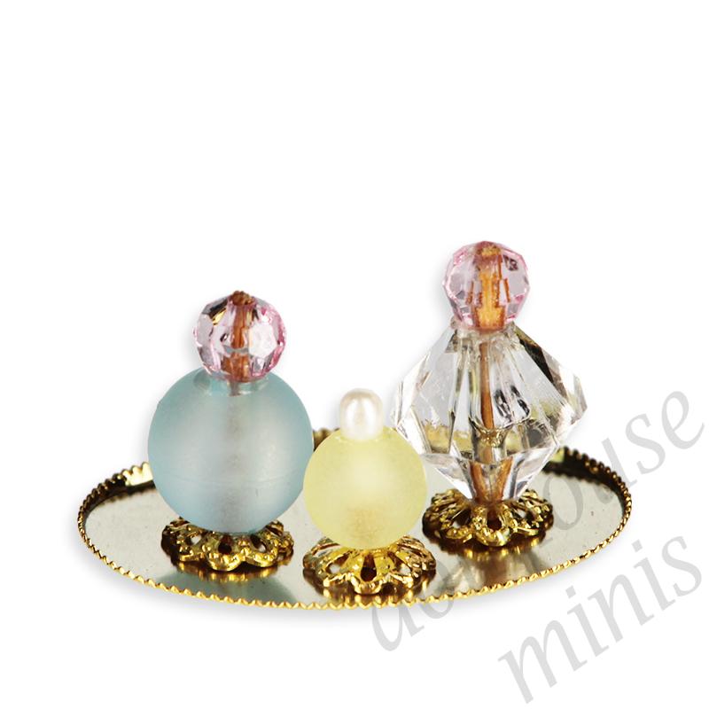 3 perfumes on oval mirror Miniature 1:12 3 perfumes on oval mirror Miniature 1:12