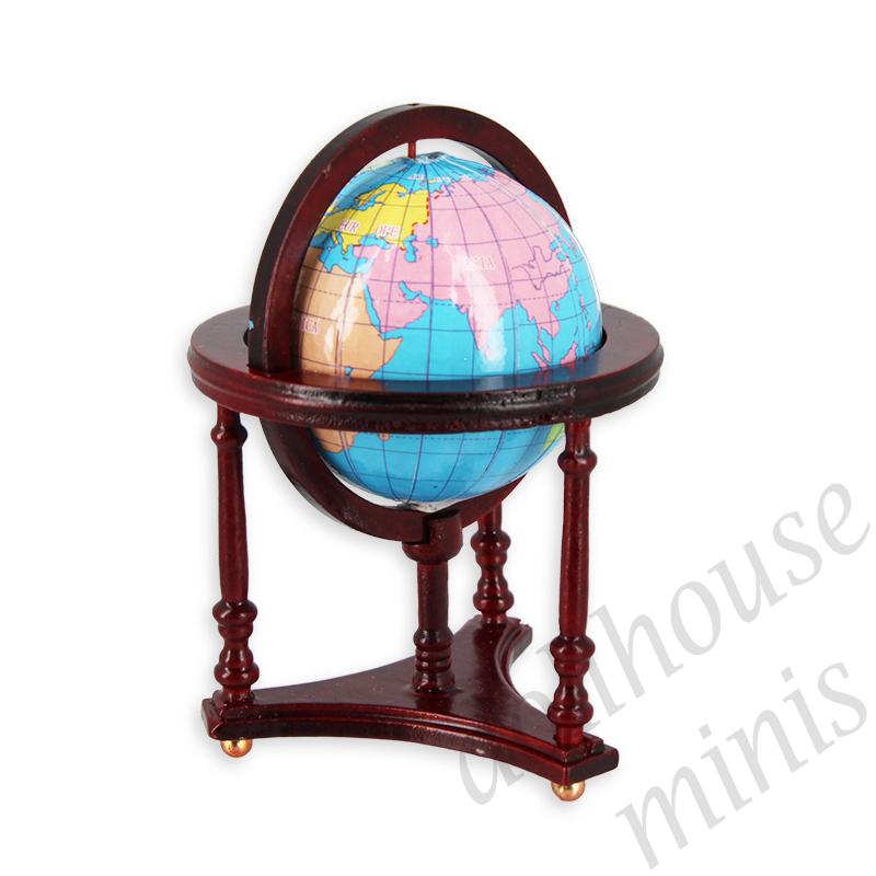 Globe on a mahogany stand Globe on a mahogany stand
