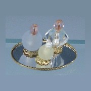 3 perfumes on oval mirror miniature 1:12